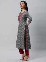 Unstitched cotton suit set with an ikat top and contrast-colored dupatta.