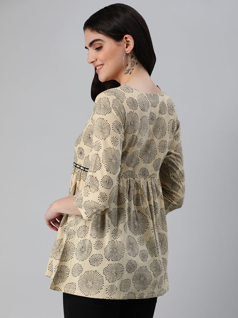 Flared bagru printed top with gathering and lace detailing at waist.