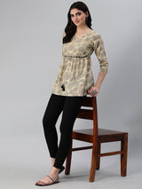 Flared bagru printed top with gathering and lace detailing at waist.