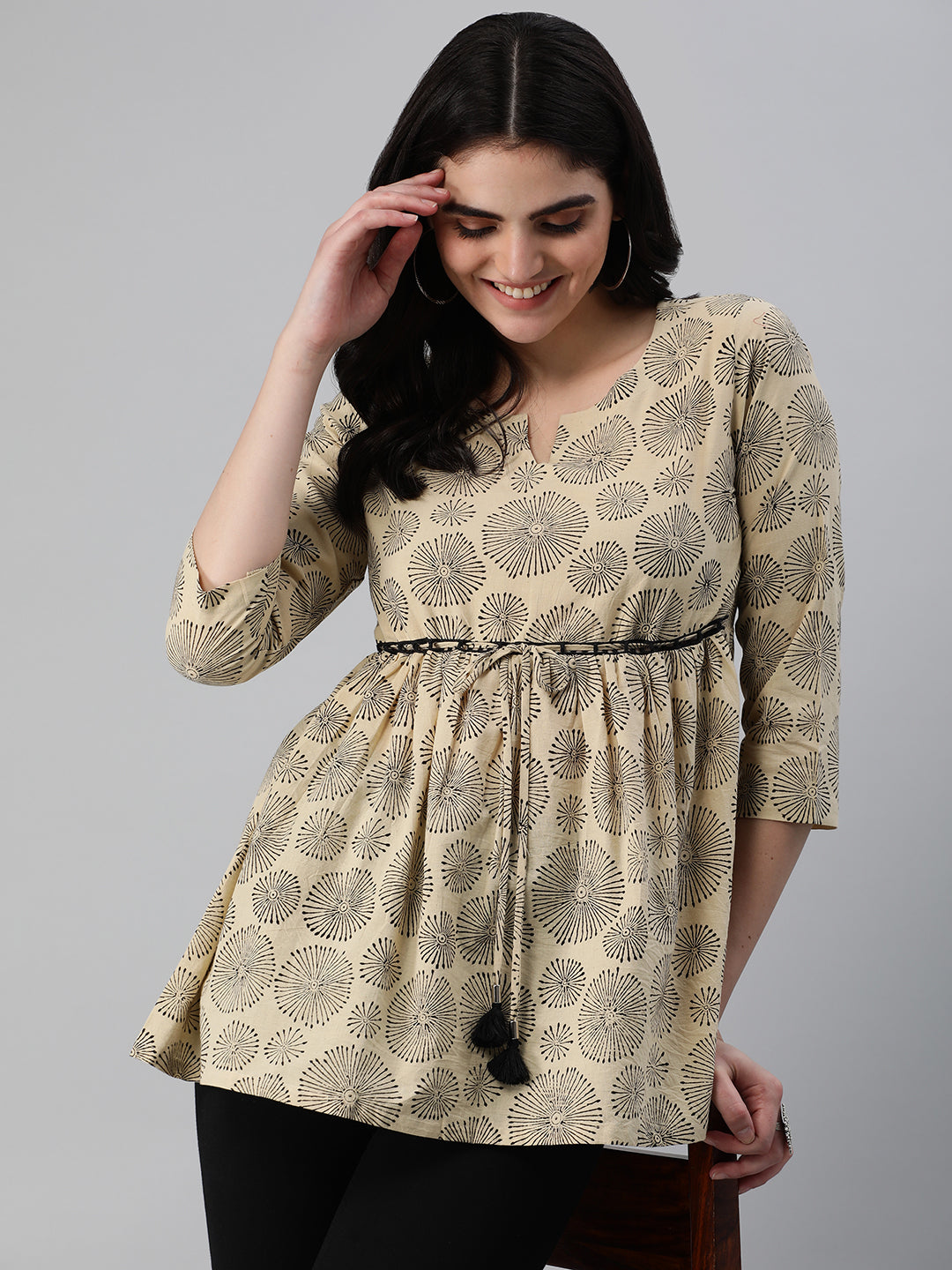 Flared bagru printed top with gathering and lace detailing at waist