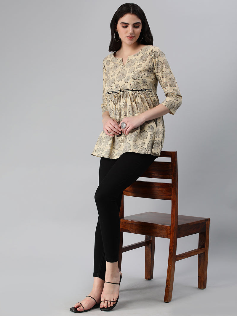 Flared bagru printed top with gathering and lace detailing at waist.