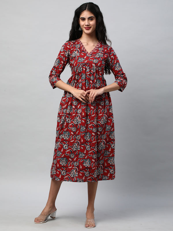Flared dress with gathering details and side pocket