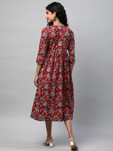 Flared dress with gathering details and side pocket