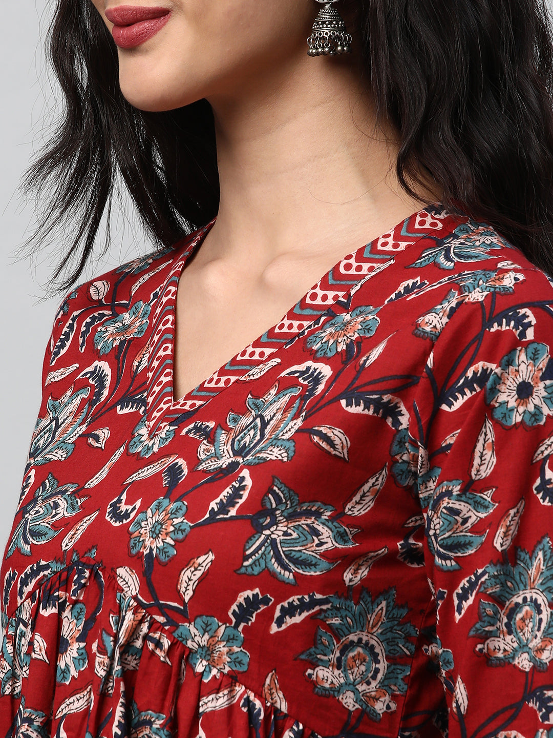 Flared dress with gathering details and side pocket