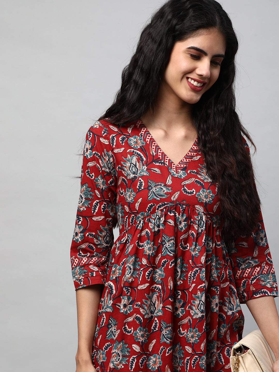 Flared dress with gathering details and side pocket