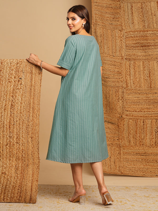 Embroidered A line dress in cotton stripe fabric with button detailing.