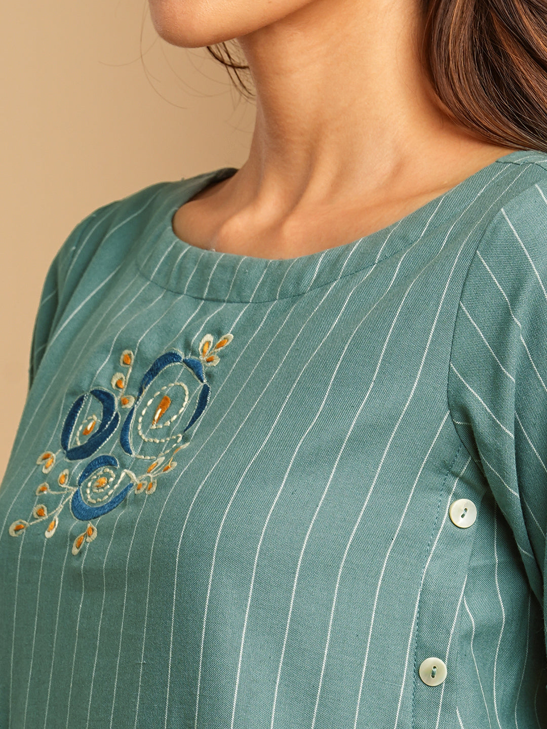 Embroidered A line dress in cotton stripe fabric with button detailing