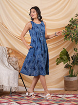 A-Line Pleated sleeveless dress in cotton dhabu print.