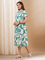 Printed cotton dress with hand embroidery and pocket.