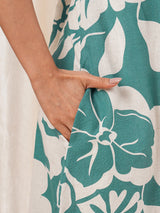 Printed cotton dress with hand embroidery and pocket.