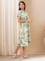 Printed cotton dress with hand embroidery and pocket.