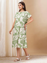 Printed cotton dress with hand embroidery and pocket.