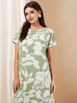 Printed cotton dress with hand embroidery and pocket.