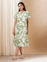 Printed cotton dress with hand embroidery and pocket.