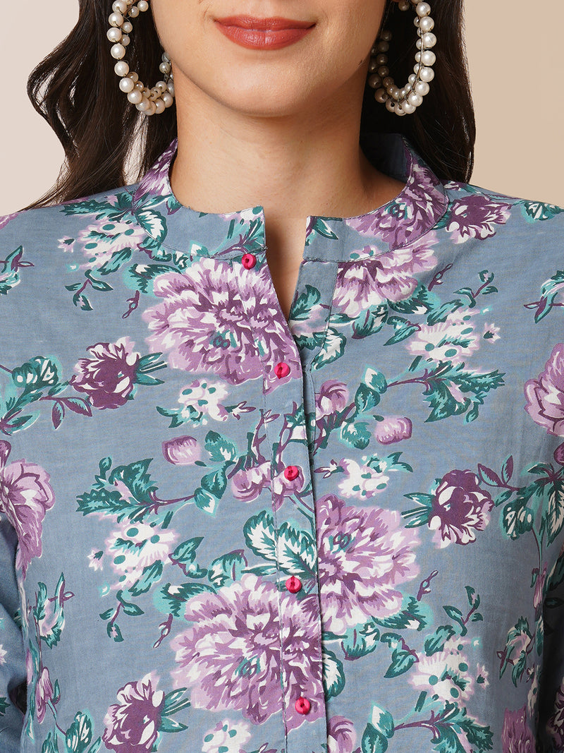 Fit and flared floral printed gathered dress with stand collar, placket and sleeve detailing.