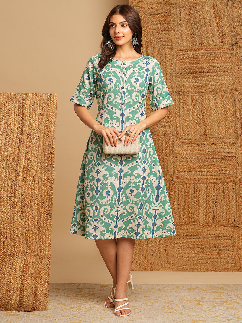 A-Line cotton Ikat dress with front placket and buttons on front.