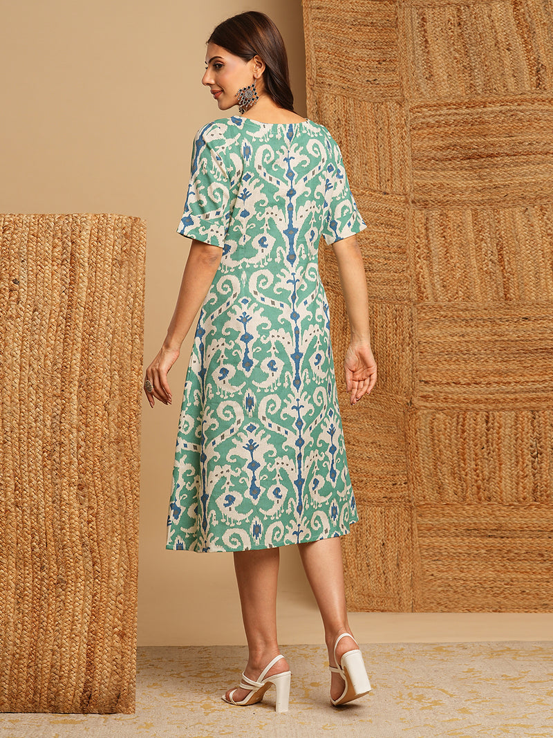 A-Line cotton Ikat dress with front placket and buttons on front.