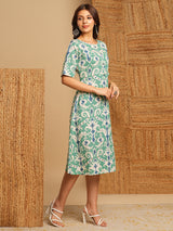 A-Line cotton Ikat dress with front placket and buttons on front.