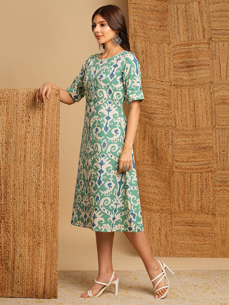 A-Line cotton Ikat dress with front placket and buttons on front.