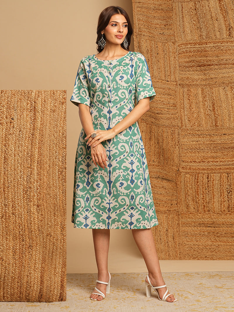 A-Line cotton Ikat dress with front placket and buttons on front.