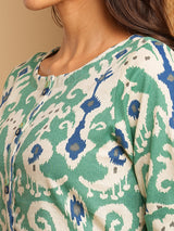 A-Line cotton Ikat dress with front placket and buttons on front.