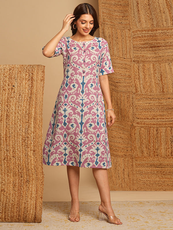 A-Line cotton Ikat dress with front placket and buttons on front.