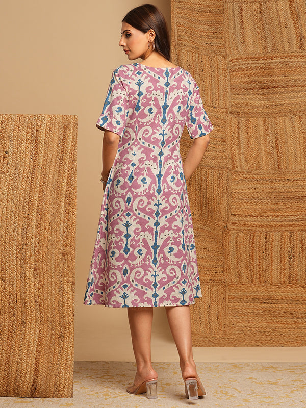 A-Line cotton Ikat dress with front placket and buttons on front.