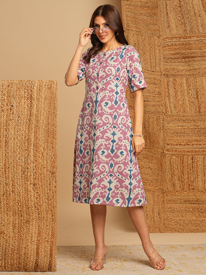 A-Line cotton Ikat dress with front placket and buttons on front.