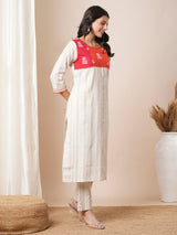 Straight kurta suit set features a handloom yoke embellished with dori work.