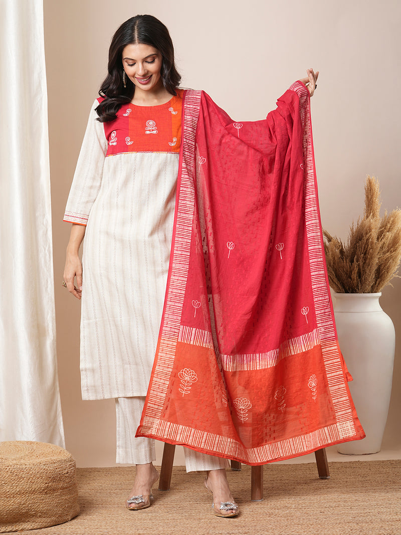 Straight kurta suit set features a handloom yoke embellished with dori work.