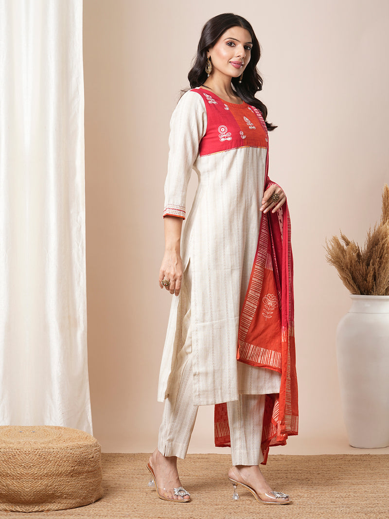 Straight kurta suit set features a handloom yoke embellished with dori work.