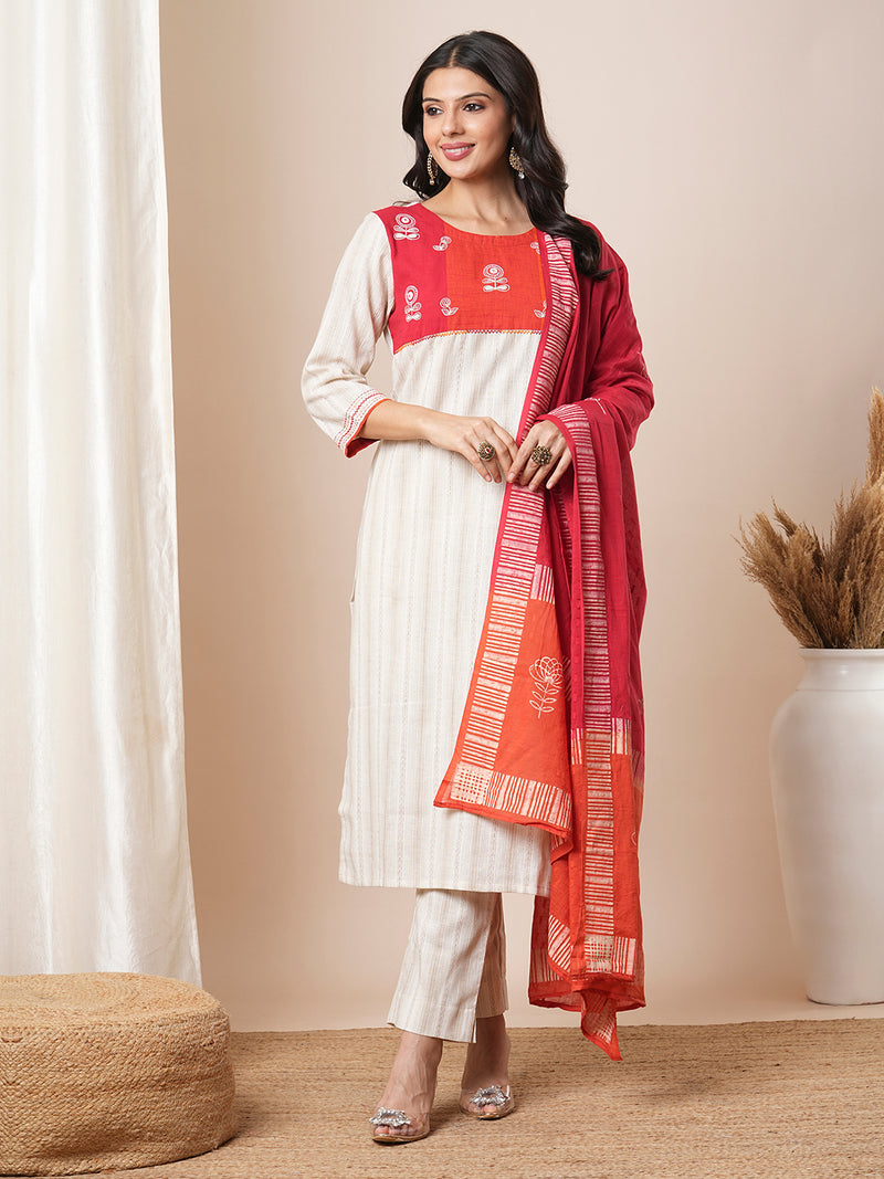 Straight kurta suit set features a handloom yoke embellished with dori work.