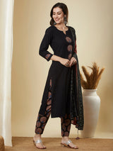 The black traditional geometric printed suit set with applique and hand detailing.