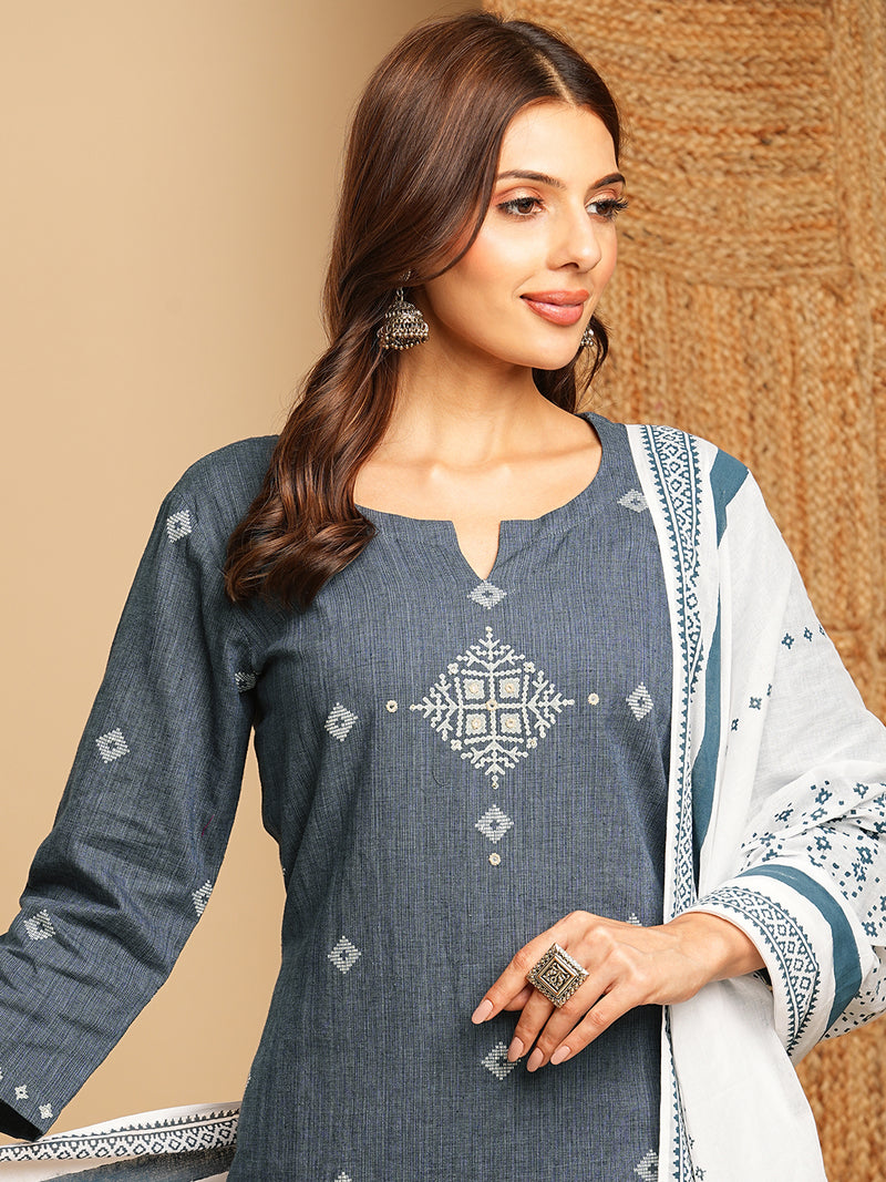 Straight kurta with minimal block print and hand work and traditional block printed dupatta.