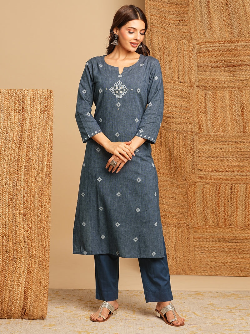 Straight kurta with minimal block print and hand work and traditional block printed dupatta.