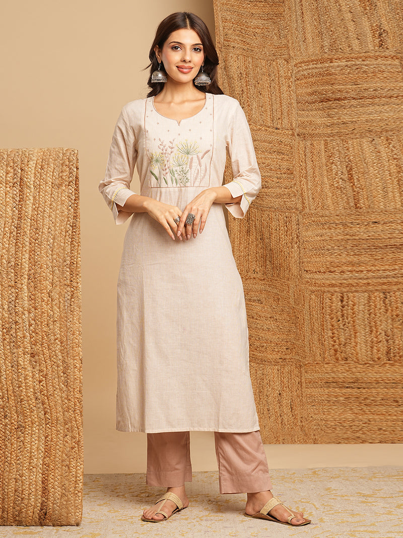 Straight kurta with delicate embroidery in yoke and hand embroidery in cuffs paired up with mul dobby dupatta with beautiful tassels.