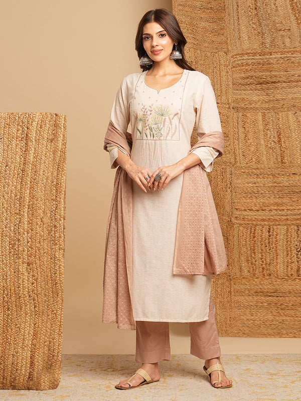 Straight kurta with delicate embroidery in yoke and hand embroidery in cuffs paired up with mul dobby dupatta with beautiful tassels.