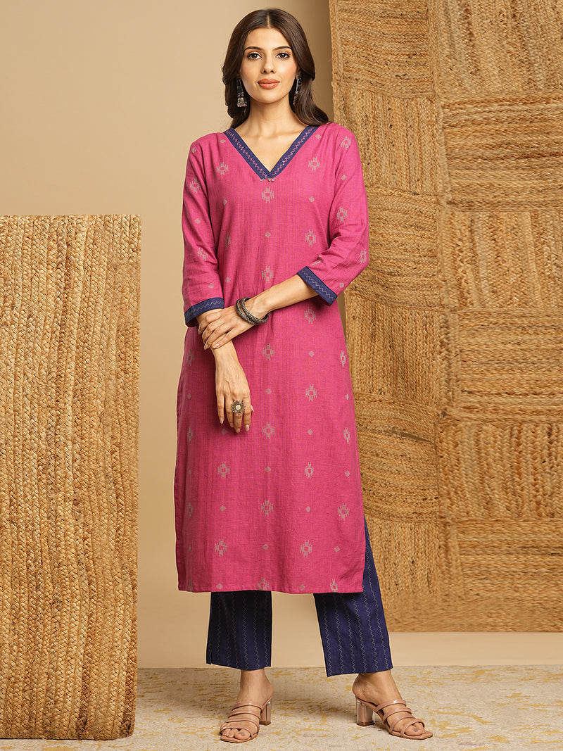 V-neck straight kurta with hand embroidery highlighted on the neckline Paired with double dye block printed  mull dupatta and straight pants.