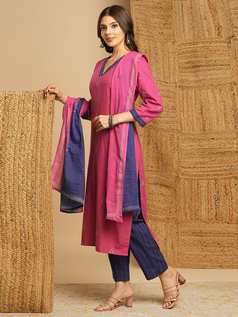 V-neck straight kurta with hand embroidery highlighted on the neckline Paired with double dye block printed  mull dupatta and straight pants.