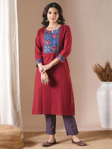 Maroon straight kurta set with traditional block printed bottoms and kota dupatta.