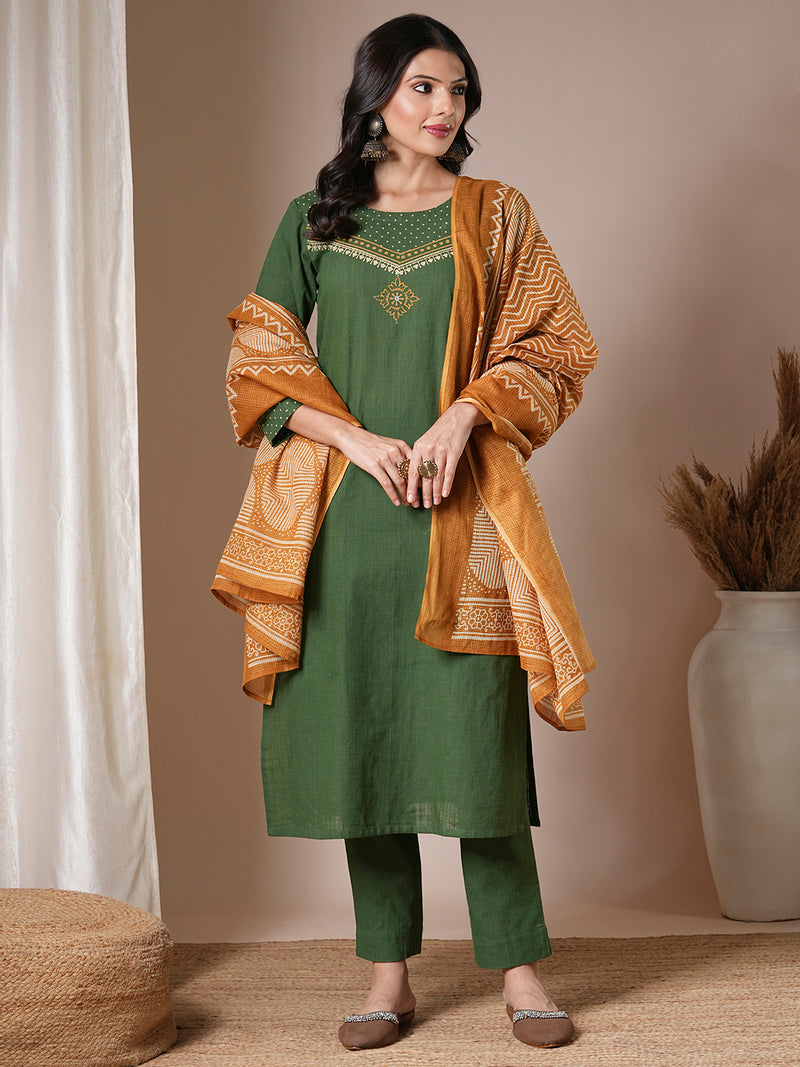 Green straight kurta set with geometrically printed mustard kota dupatta.