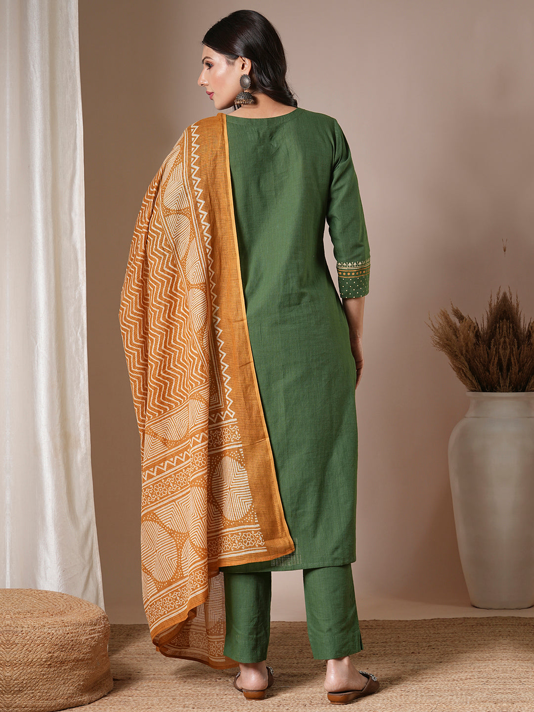 Green straight kurta set with geometrically printed mustard kota dupatta