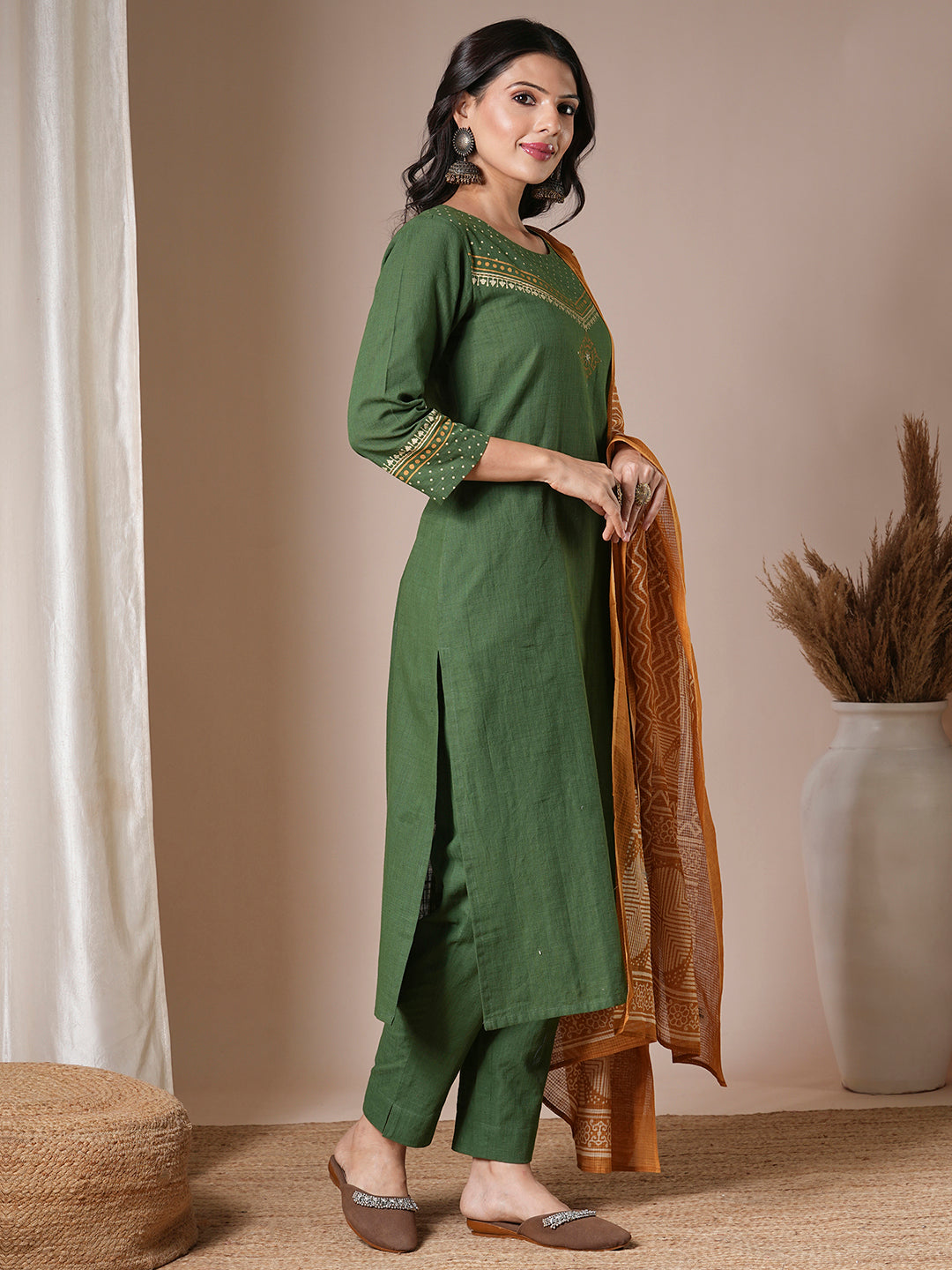 Green straight kurta set with geometrically printed mustard kota dupatta
