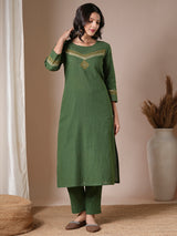 Green straight kurta set with geometrically printed mustard kota dupatta.