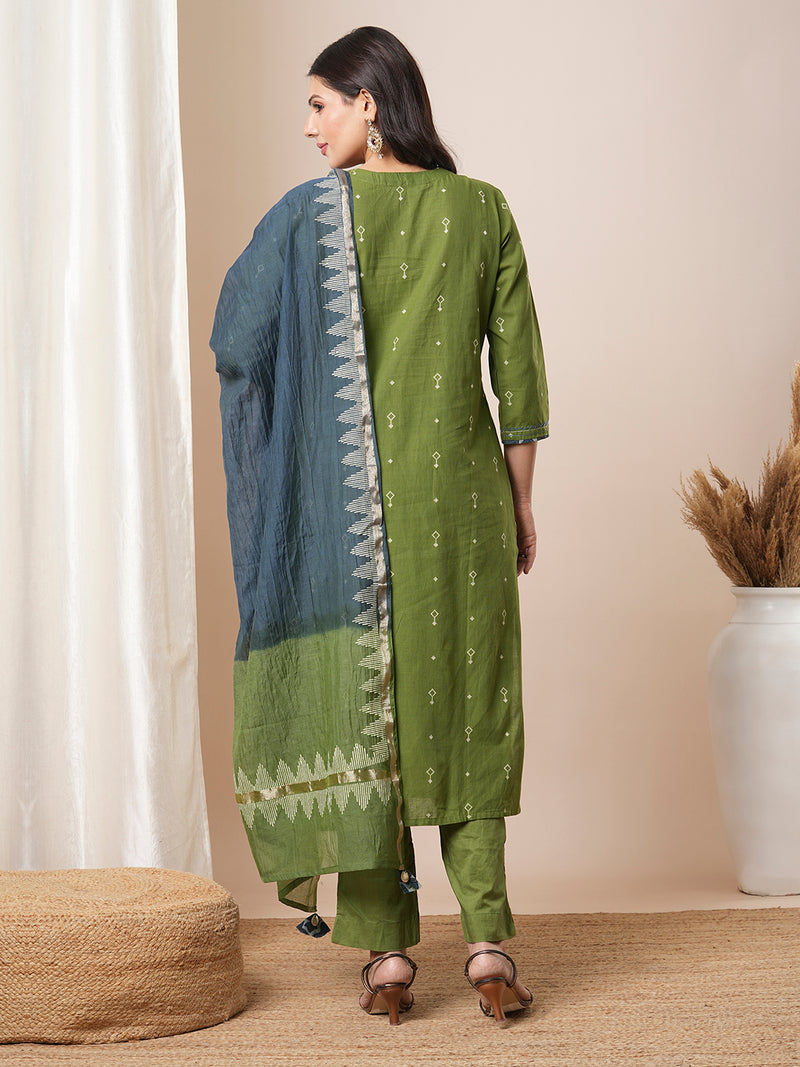 V-neck green dobby butti straight kurta suit set with floral dabu print yoke highlighted with handwork.