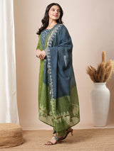 V-neck green dobby butti straight kurta suit set with floral dabu print yoke highlighted with handwork.