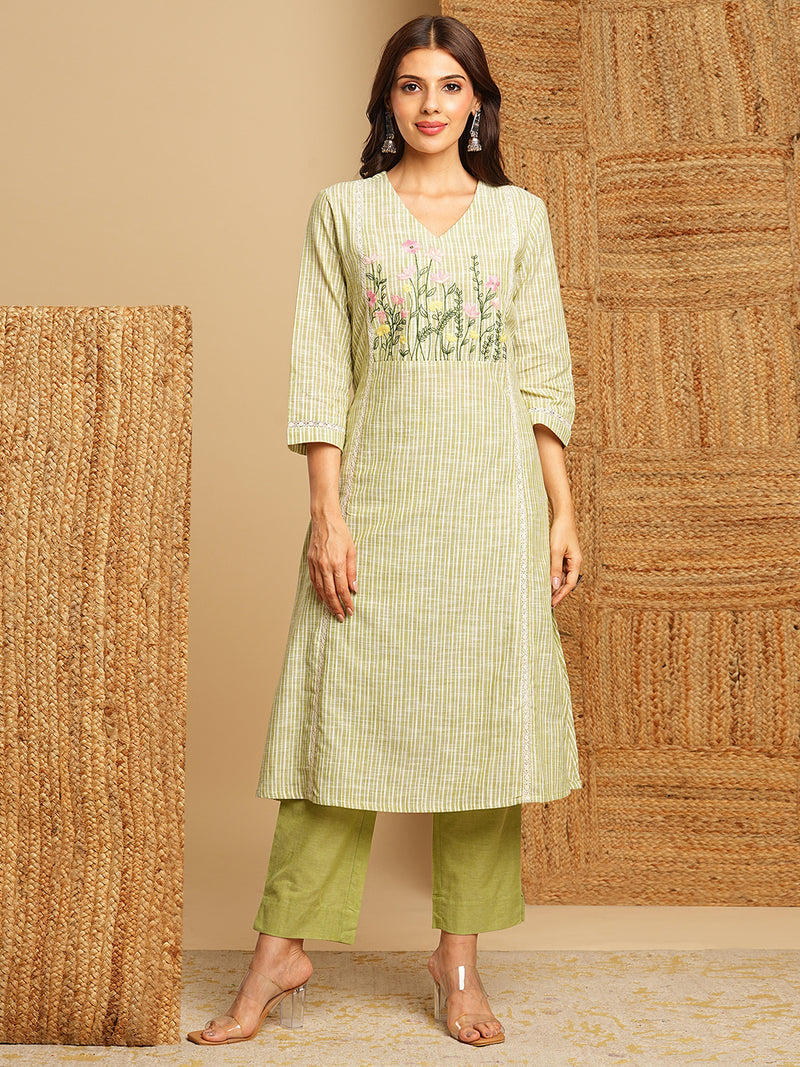 Light green straight kurta with delicate lace detailing  and embroidery on the yoke paired With a beige mull dupatta and self bottom.