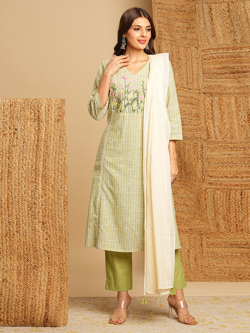 Light green straight kurta with delicate lace detailing  and embroidery on the yoke paired With a beige mull dupatta and self bottom.