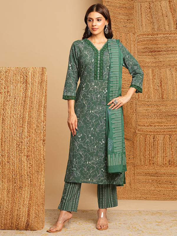 Green floral straight suit set with lace embellishment at the neckline and cuffs.