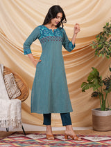 A line striped kurta with printed cotton trim,block print and hand embroidery.